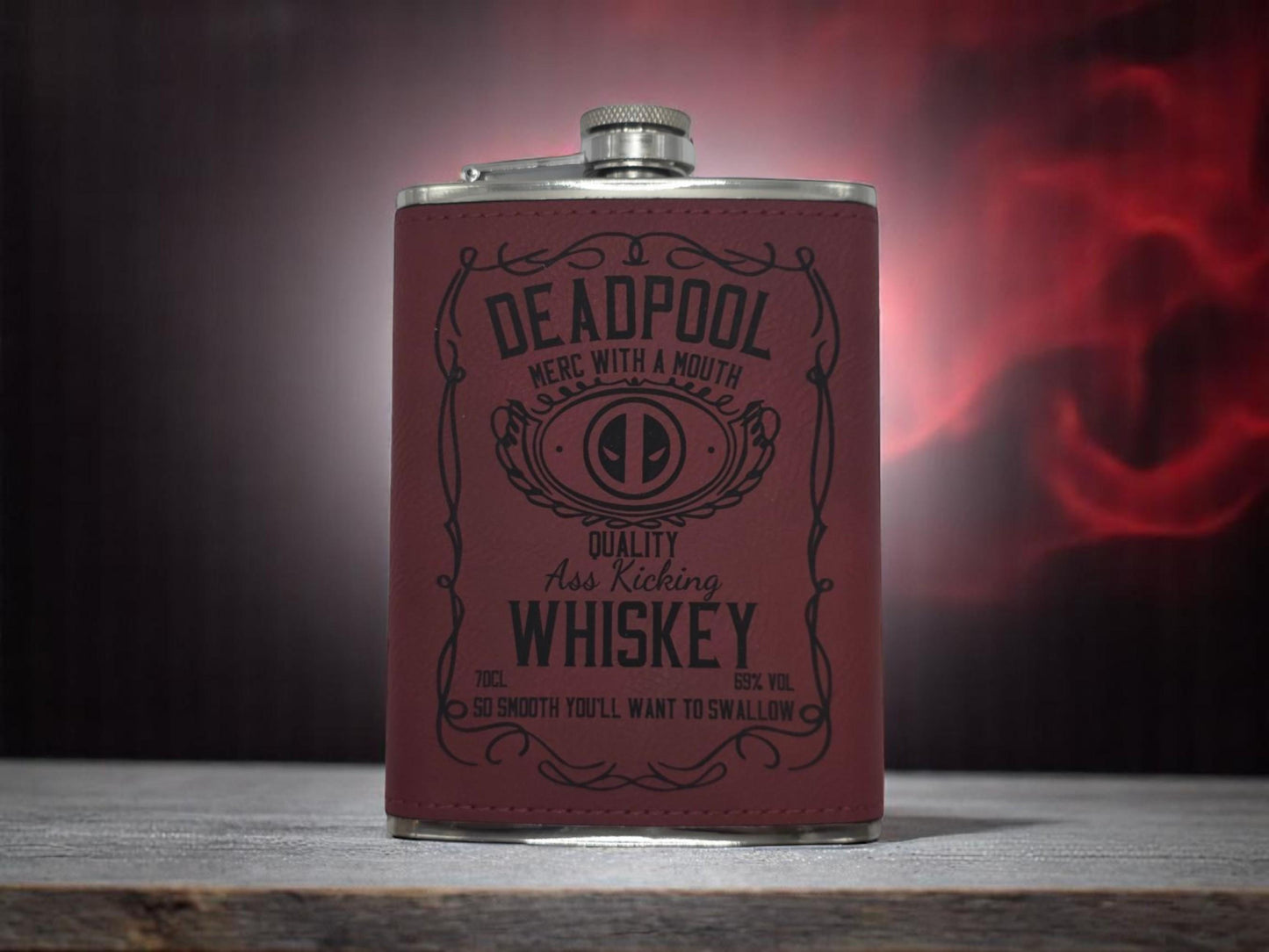 a red leather flask is sitting on a table