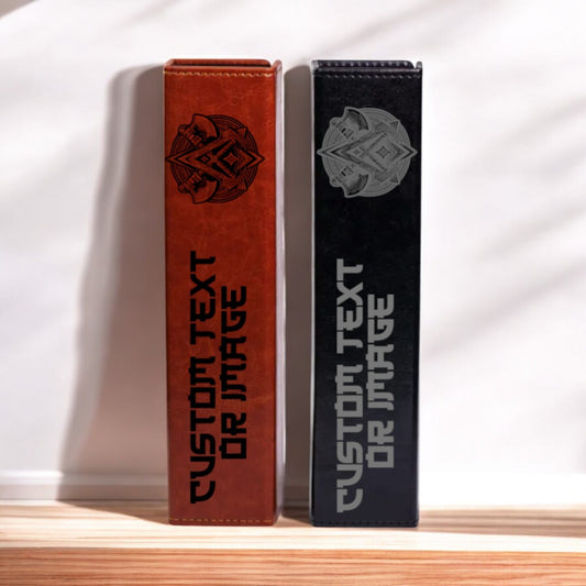 Two leather-bound books or binders with custom text printed on them, placed side by side on a wooden surface.