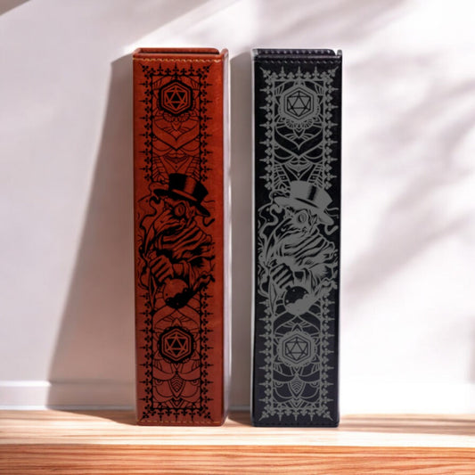 Two leather-bound books with intricate designs on their covers are displayed side by side on a wooden surface.