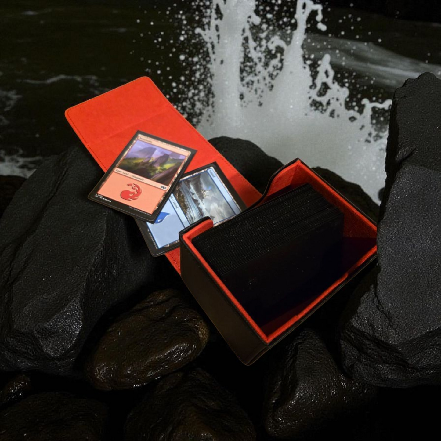 A red Magic: the Gathering card deck is shown, with the deck open and the cards visible, set against a backdrop of a waterfall and rocks.