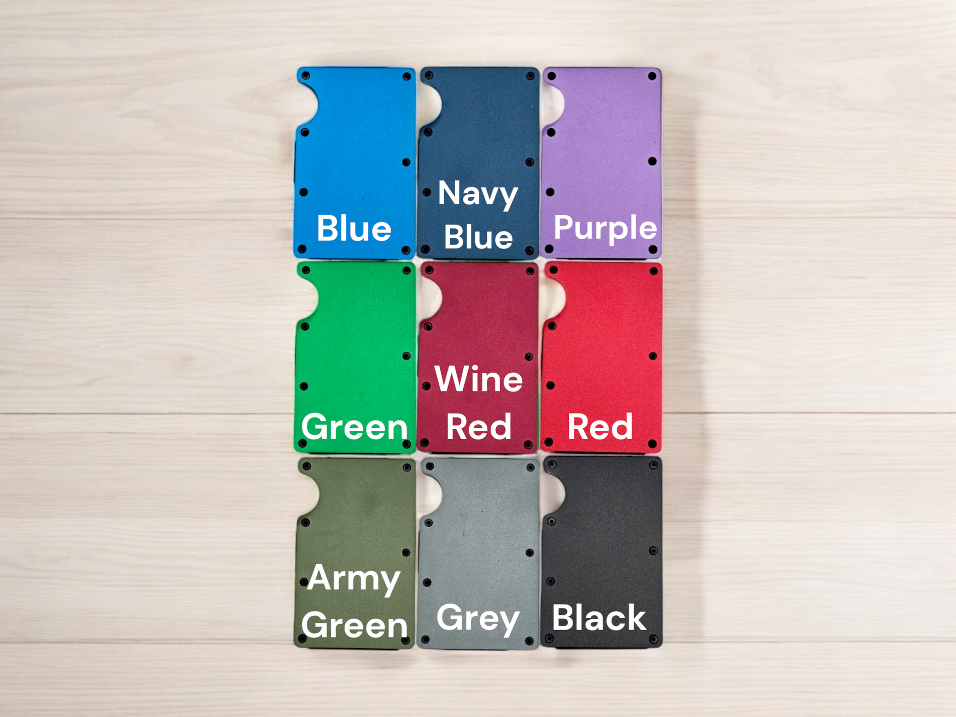 A collection of colorful wallet cards arranged in a grid, each with a different color and labeled with a different color.