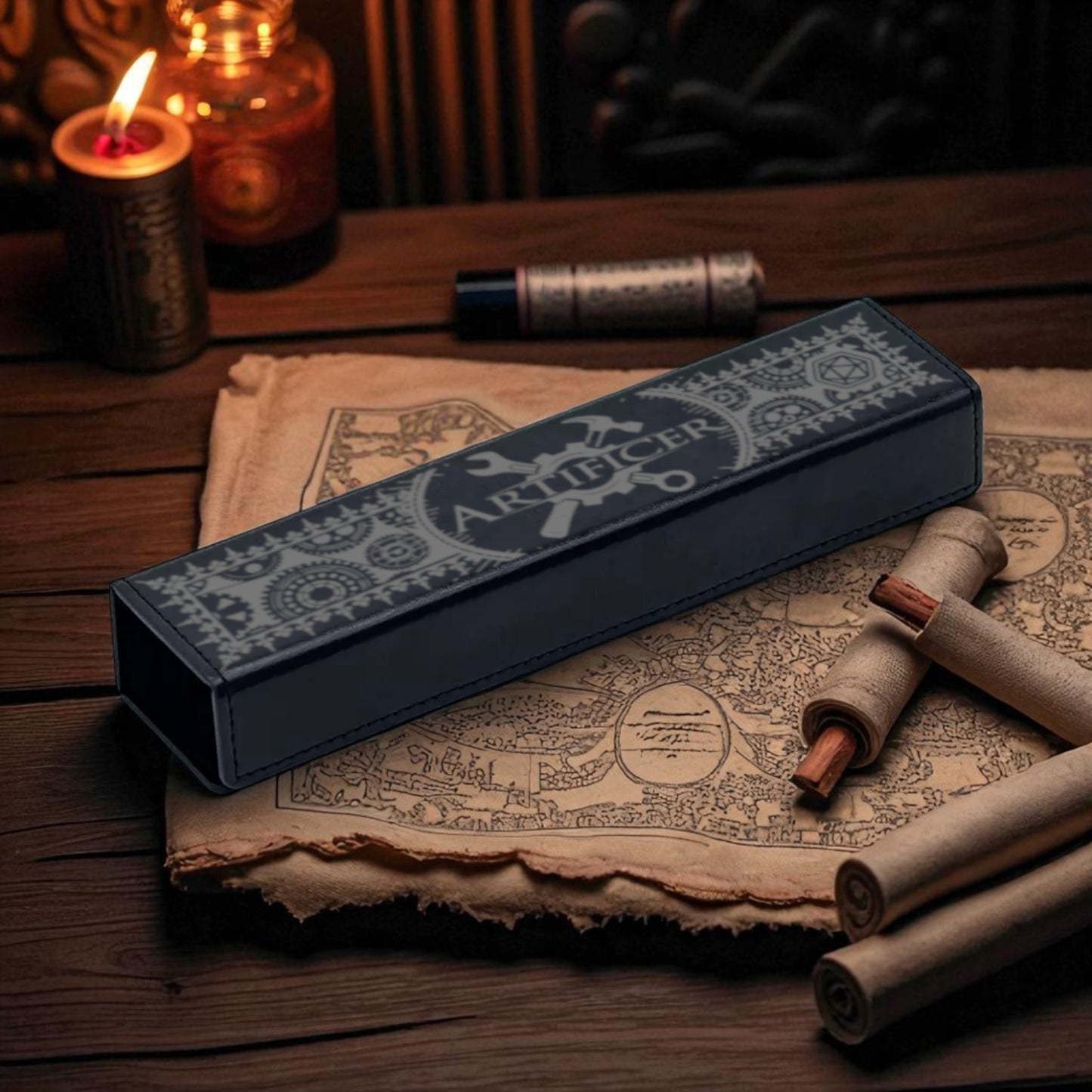 a long, rectangular object with a patterned design on it, placed on a wooden surface. There are also some rolled-up objects, possibly wax or paper, and a candle in the background.