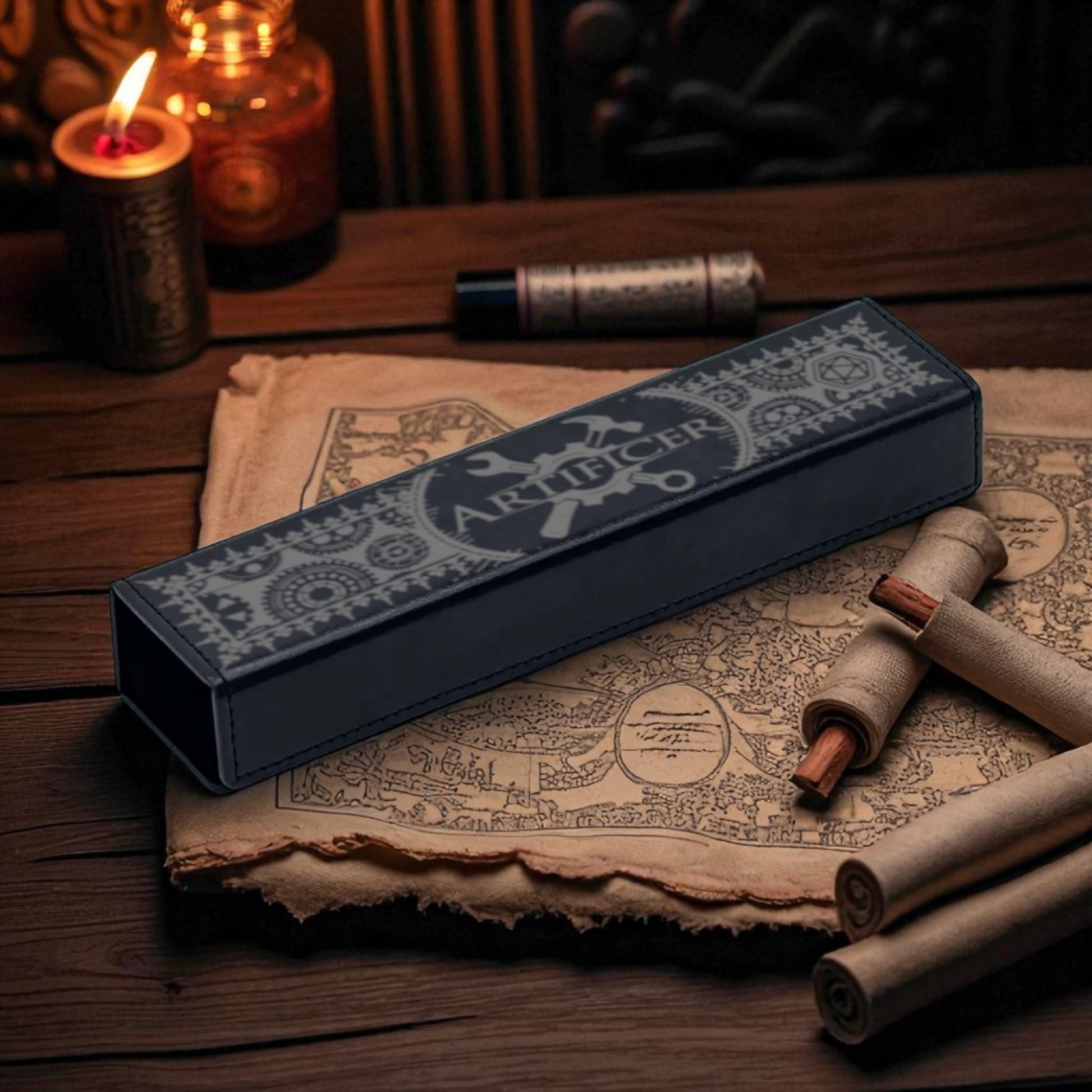 a long, rectangular object with a patterned design on it, placed on a wooden surface. There are also some rolled-up objects, possibly wax or paper, and a candle in the background.