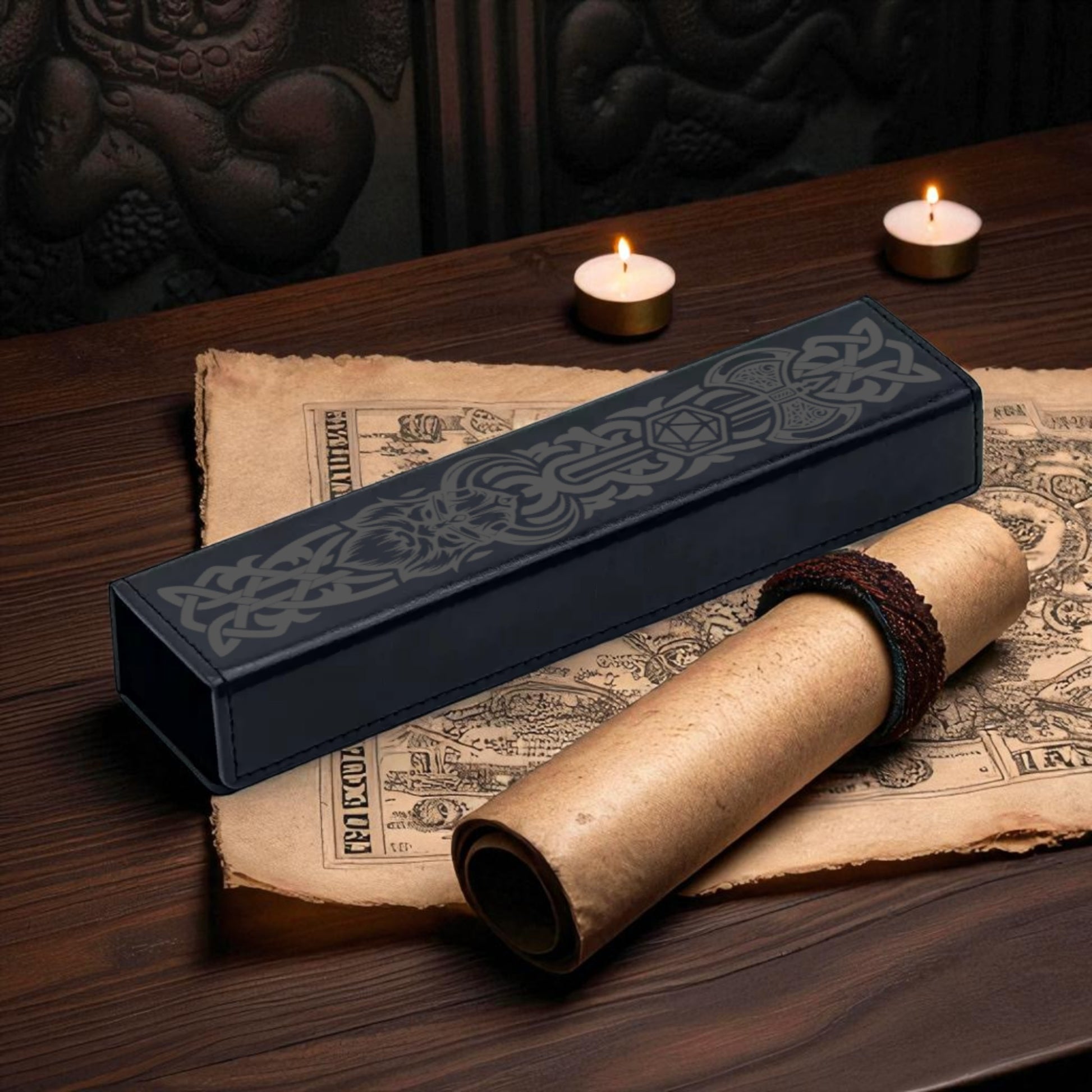 a rolled-up parchment or scroll, a black box with a decorative design, and two lit candles on a wooden surface.