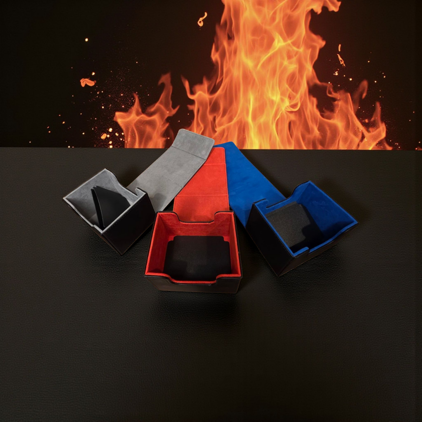 three different colored boxes, with a background of flames.